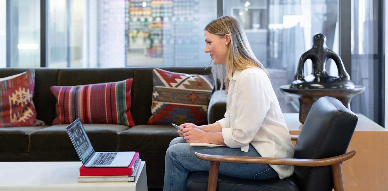 Person sat down speaking on video call